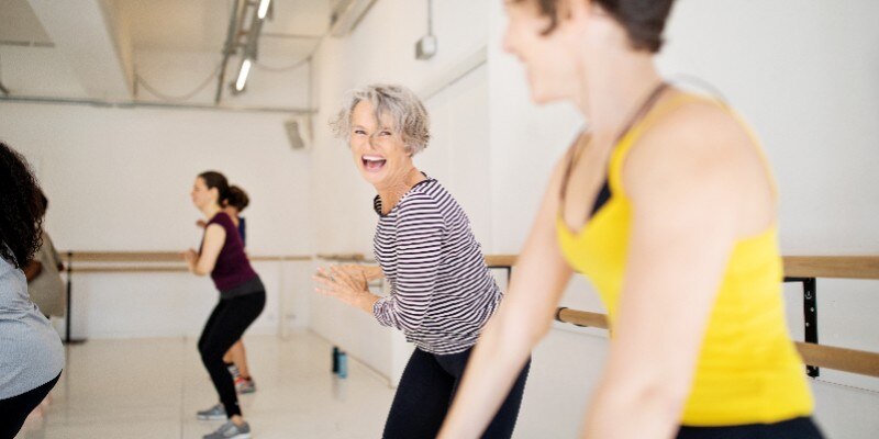 older adult woman dancing
