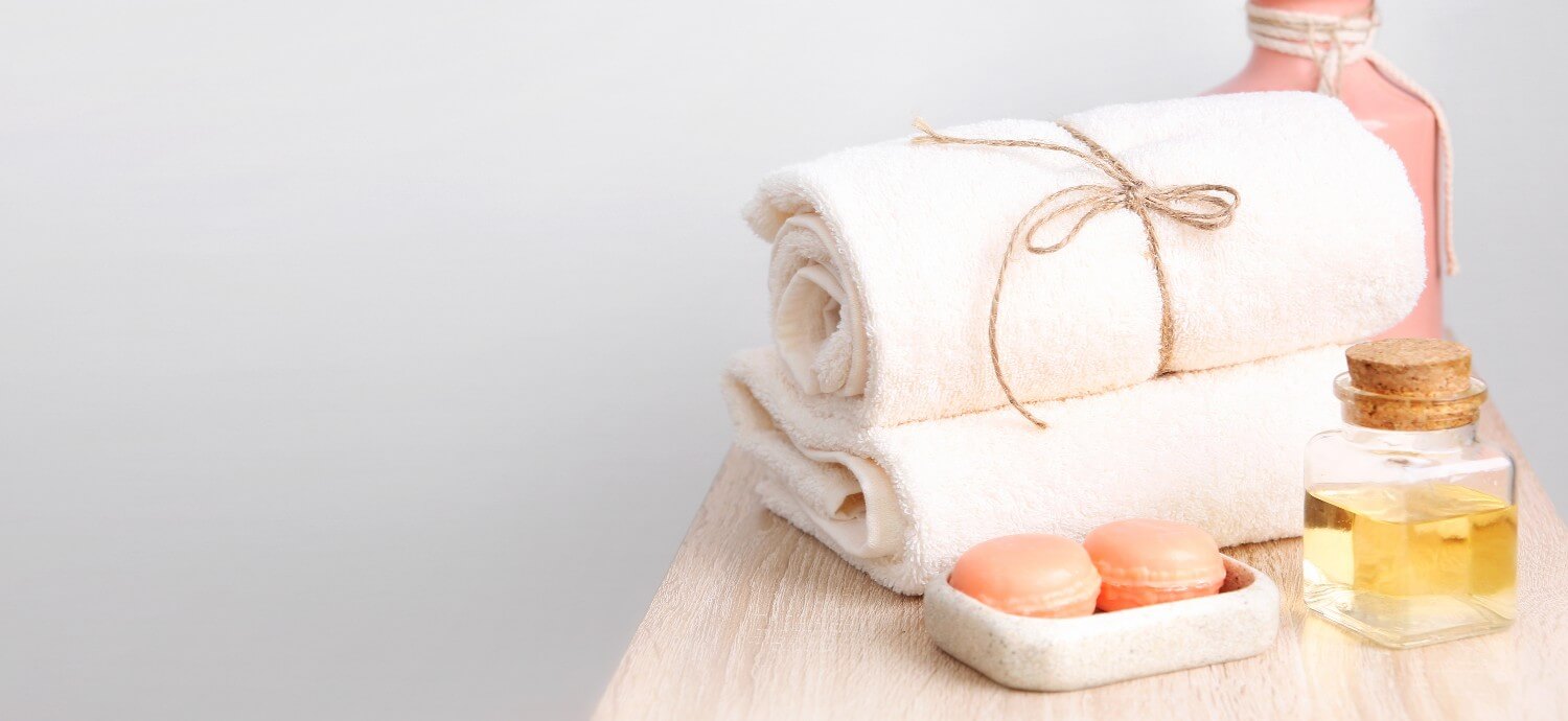 towels with essential oil in a clean house