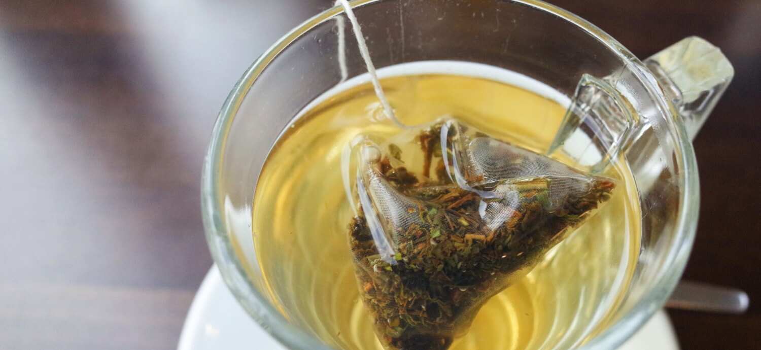 a glass of green tea