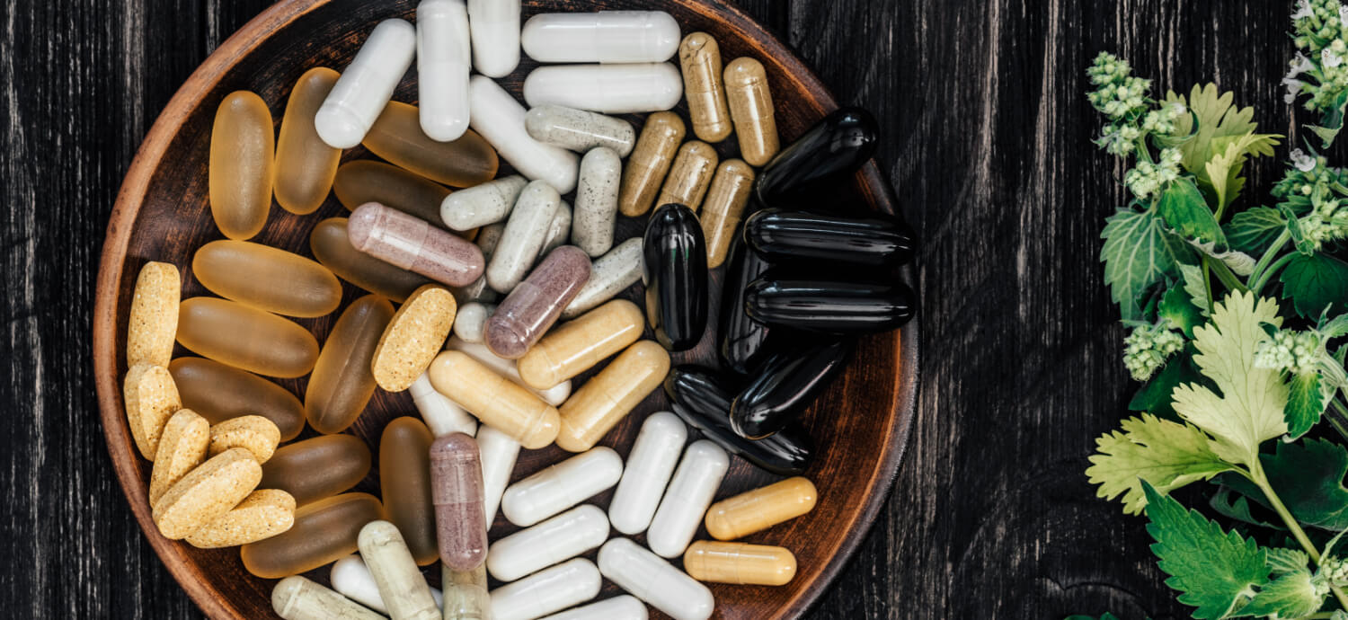 supplements in a bowl that support thyroid health