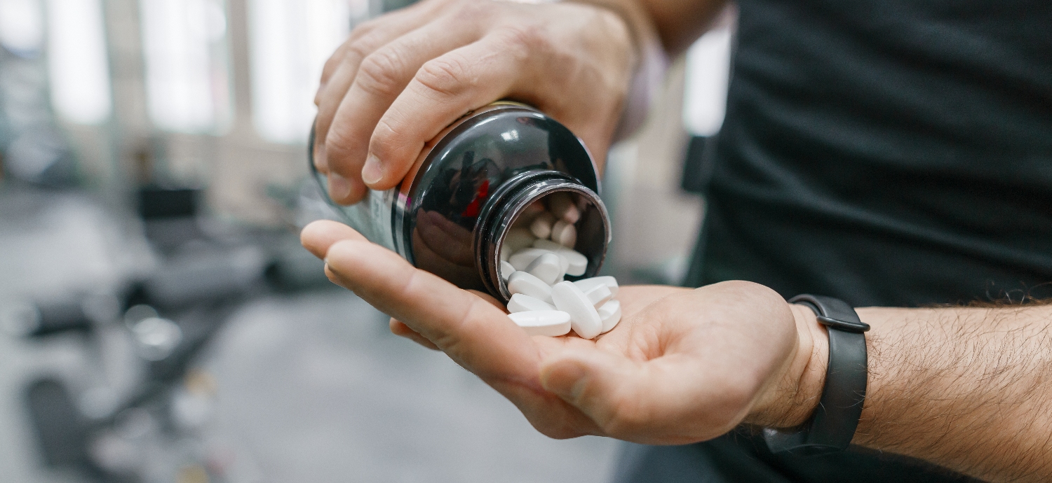 man pouring supplements into hand s You Need to Know About
